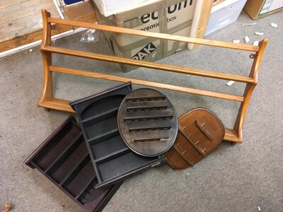 An Ercol plate rack together with two small open shelves