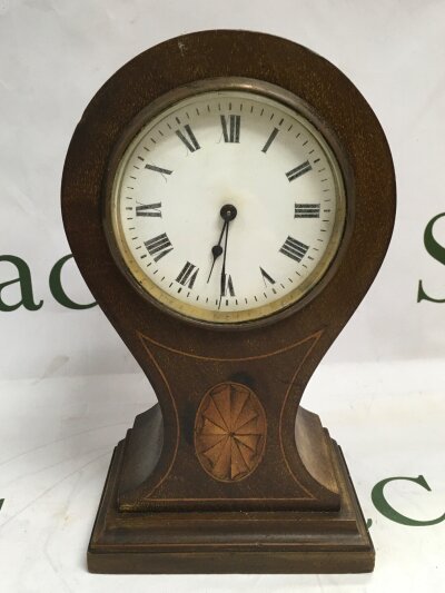 A 19th century antique balloon style mantle clock.