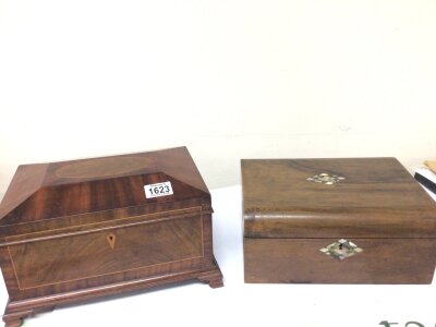 An inlaid Mahogany Casket with a shaped top the interior with a detachable oak fitted tray and a Walnut box (2)