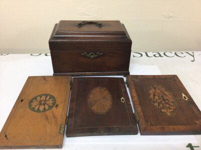 A George III late 18th Century Mahogany tea caddy no interior and three 18th century inlaid small cabinet or bureau interior doors (4)