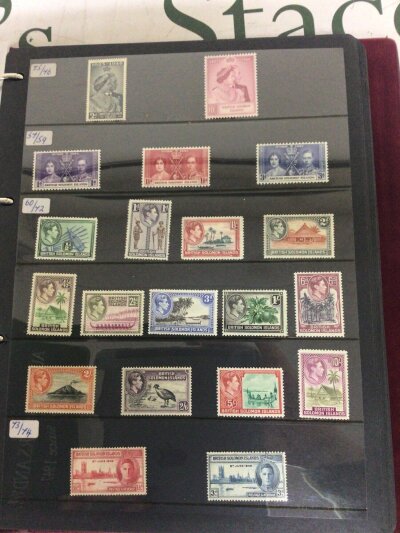 An album containing very well presented stamps mostly unused The British Solomon Islands from George VI and Elizabeth II and Solomon Island stamps.- NO RESERVE