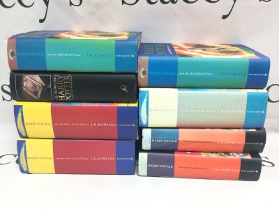 eight Harry Potter first edition books including typo on page 99 of Half Blood Prince