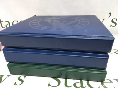 Three albums of presentation packs