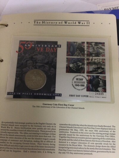 An album containing The History of World War II Coin Covers and Sydney Olympic 2000 a collection of Coin Covers.