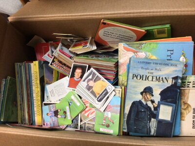 A collection of Vintage ABC football cards cigarette cards and Vintage Ladybird books.