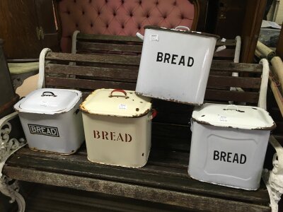 Four enamel bread bins