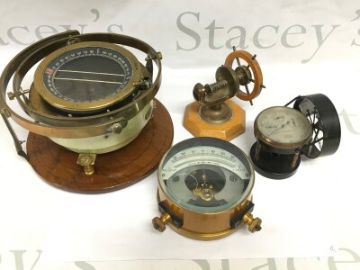 A nautical compass and other instruments.- NO RESERVE