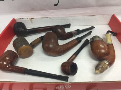 Seven vintage smoking pipes