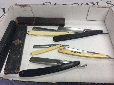 Five vintage straight razors