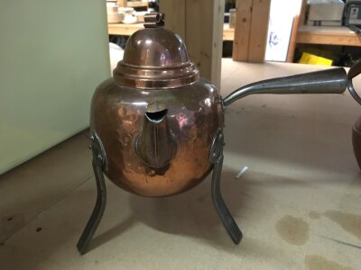 A copper and steel arts and crafts coffee pot