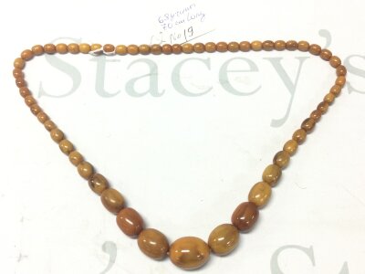 A Bakelite butterscotch amber style necklace, 68 grams, 70cm long