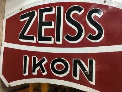 A  double sided enamel sign Zeiss Ikon 50 cm x 80 cm.