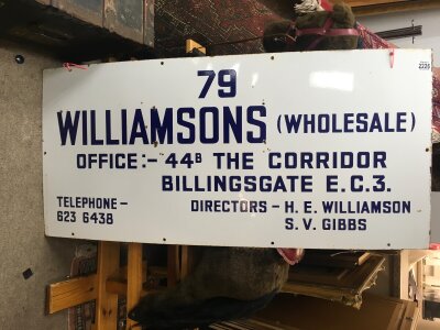 A white enamel sign Williamson ( wholesale )  Billingsgate ,
115 x 52 cm  from the old Billingsgate  fish market on Lower Thames street London.