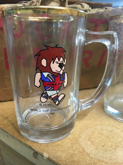 A collection of 12 World Cup 1966 glasses depicting World Cup Willy .