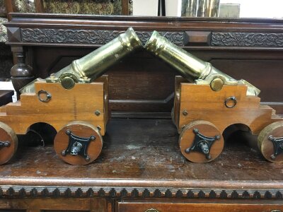 A pair of bass signal cannons mounted on a carriage 50 cm x 40 cm  bore size 4 cm .