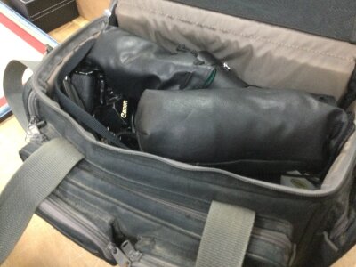 A bag of Camera equipment including a Canon F1, Canon AE1 , Canon 210mm lens etc