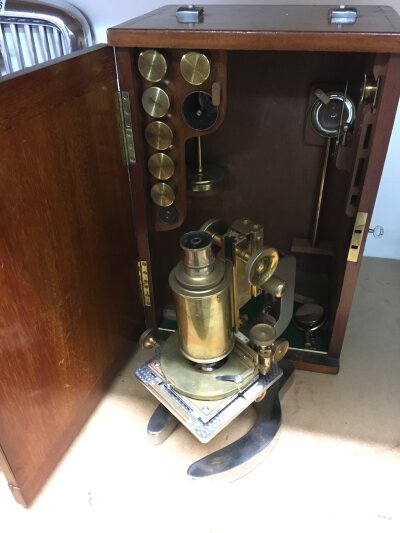 A Beck of London steel and brass cased microscope, model 1