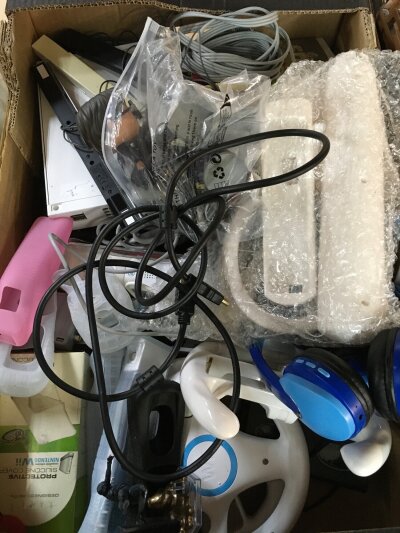 Two Nintendo Wii consoles, three controllers and games including Super Paper Mario, various other toys including marvel figures