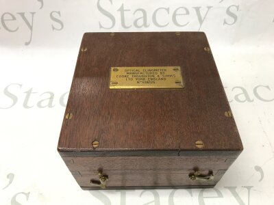 A cased optical clinometer by Cooke troughton and simms