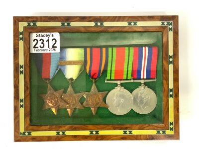 A framed set of WW2 medals.