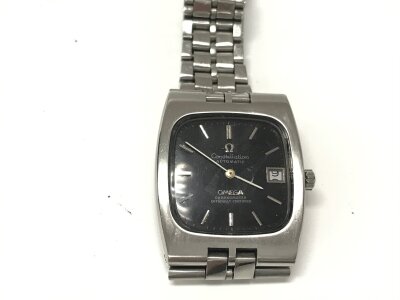 A vintage Omega constellation square face. Black dial. Not seen running.