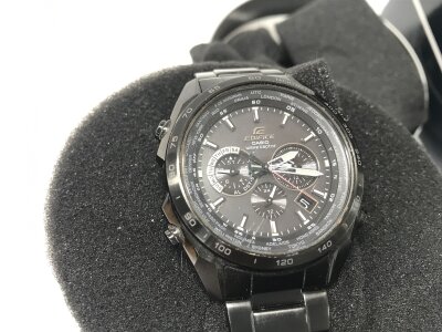 Casio Edifice Wave Ceptor watch features a black stainless steel case and bracelet. Seen running.