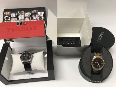 A boxed Tissot PR100 seen running and a Boxed Citizen.