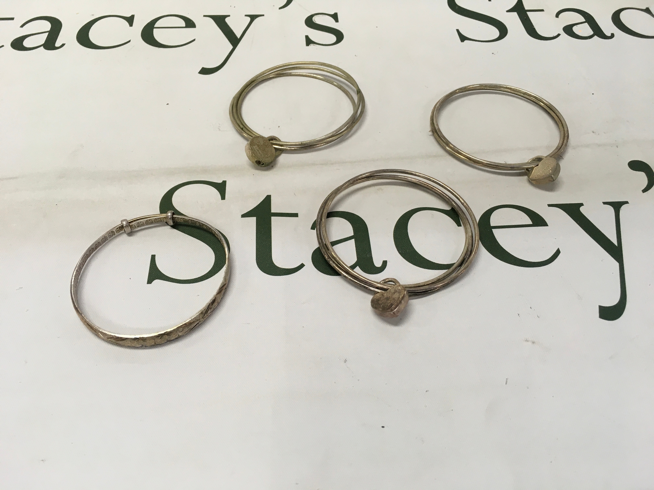 Tiffany and Co. 1837 collection sterling silver triple bangles