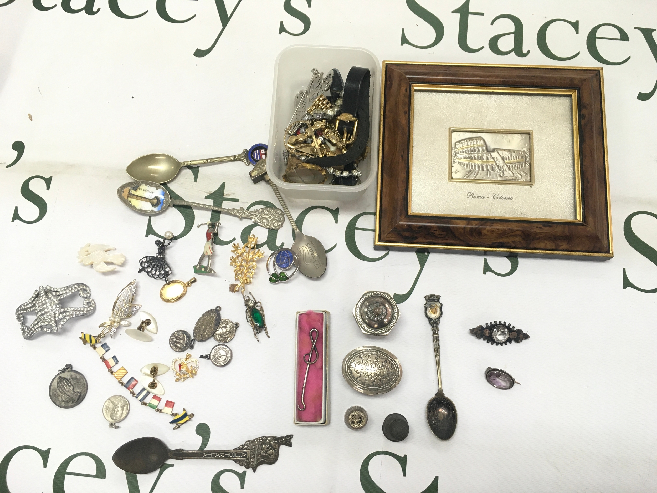 Framed silver colosseum image and spoons and hm silver boxes, brooches and silver base clef button hook.