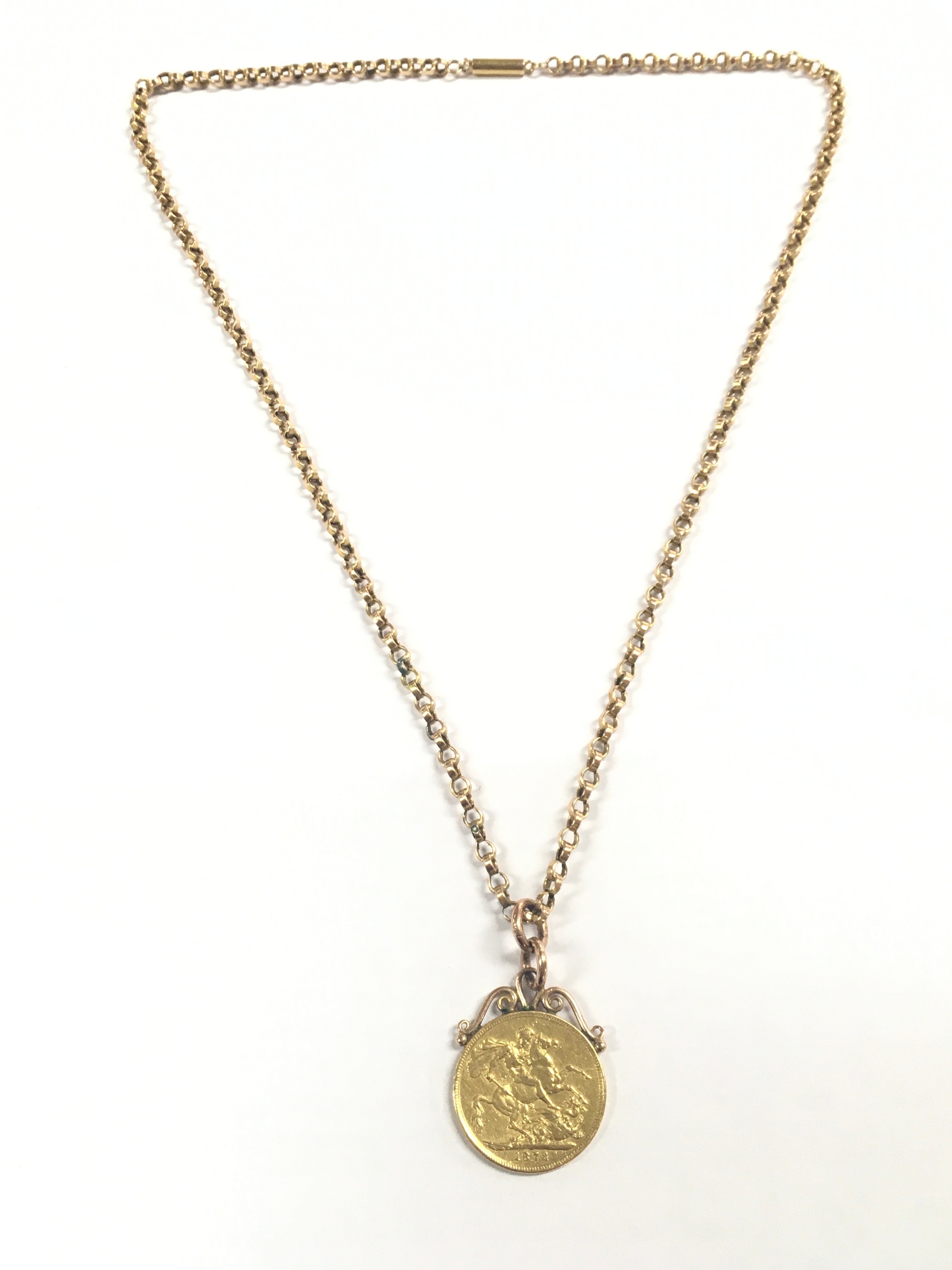 A Victorian 1872 sovereign with chain, 24cm long. 15.9g