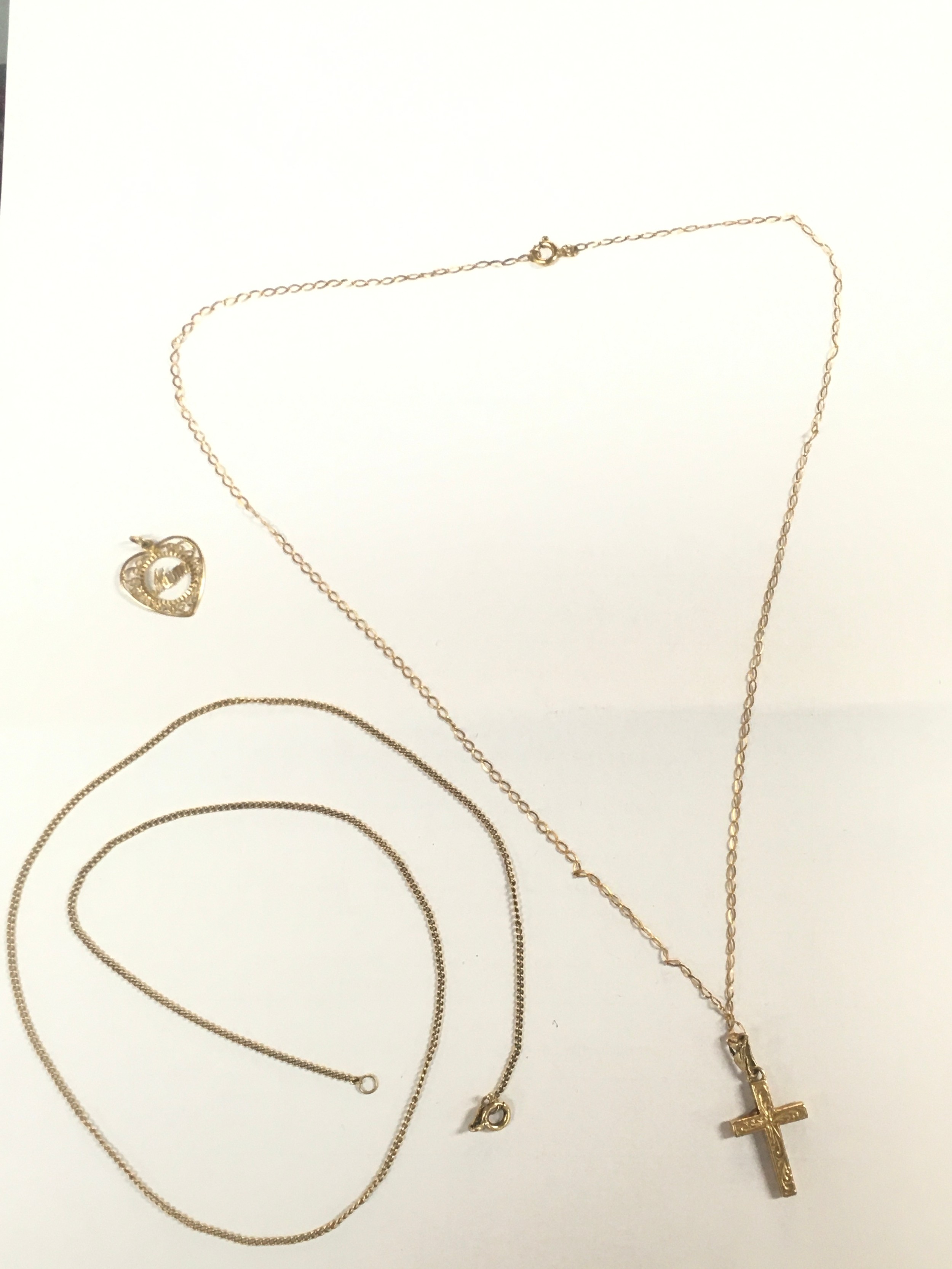 9ct gold cross and chain, and one other lot. 8g total weight