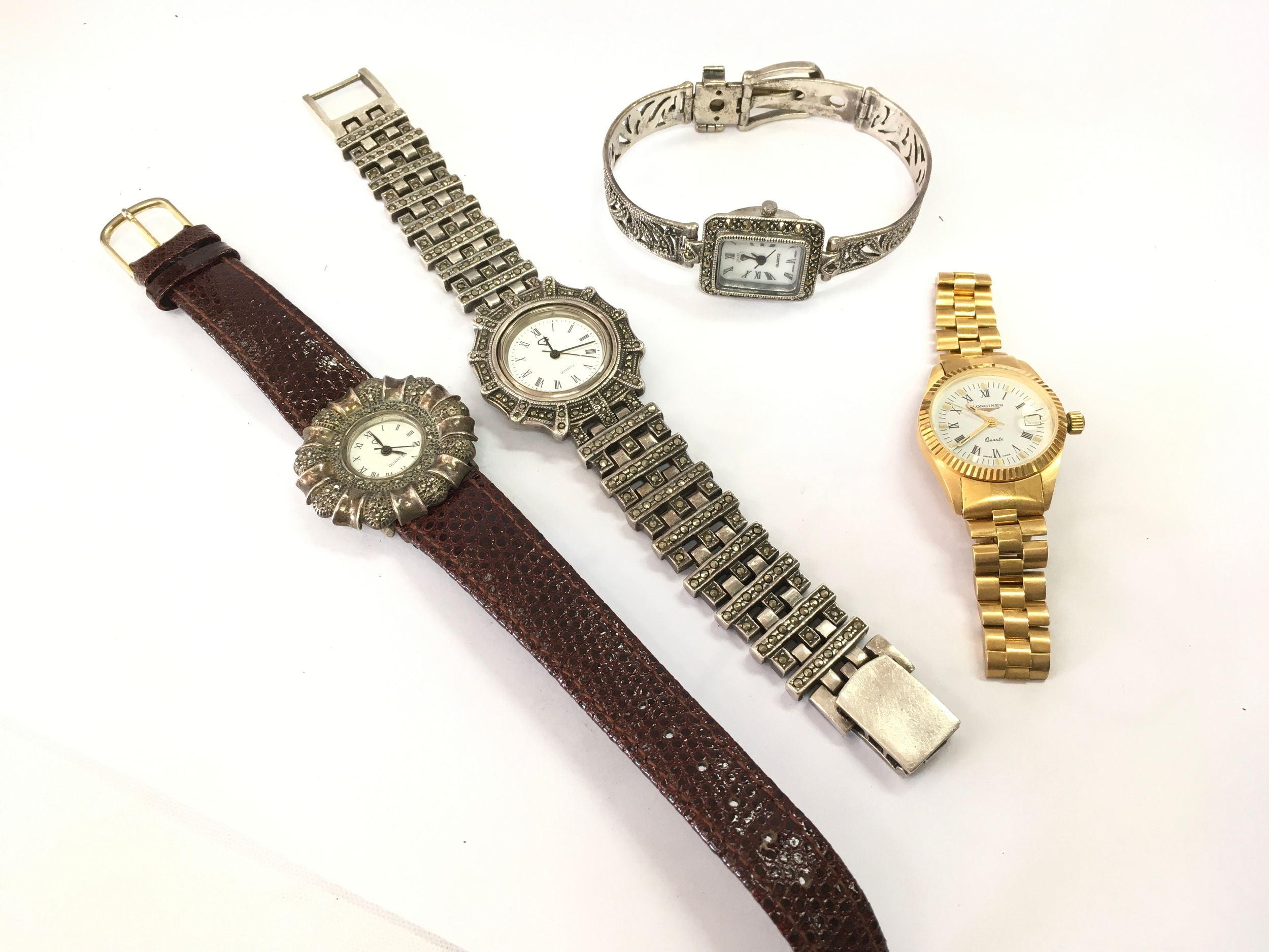 Four dress watches including Longines 