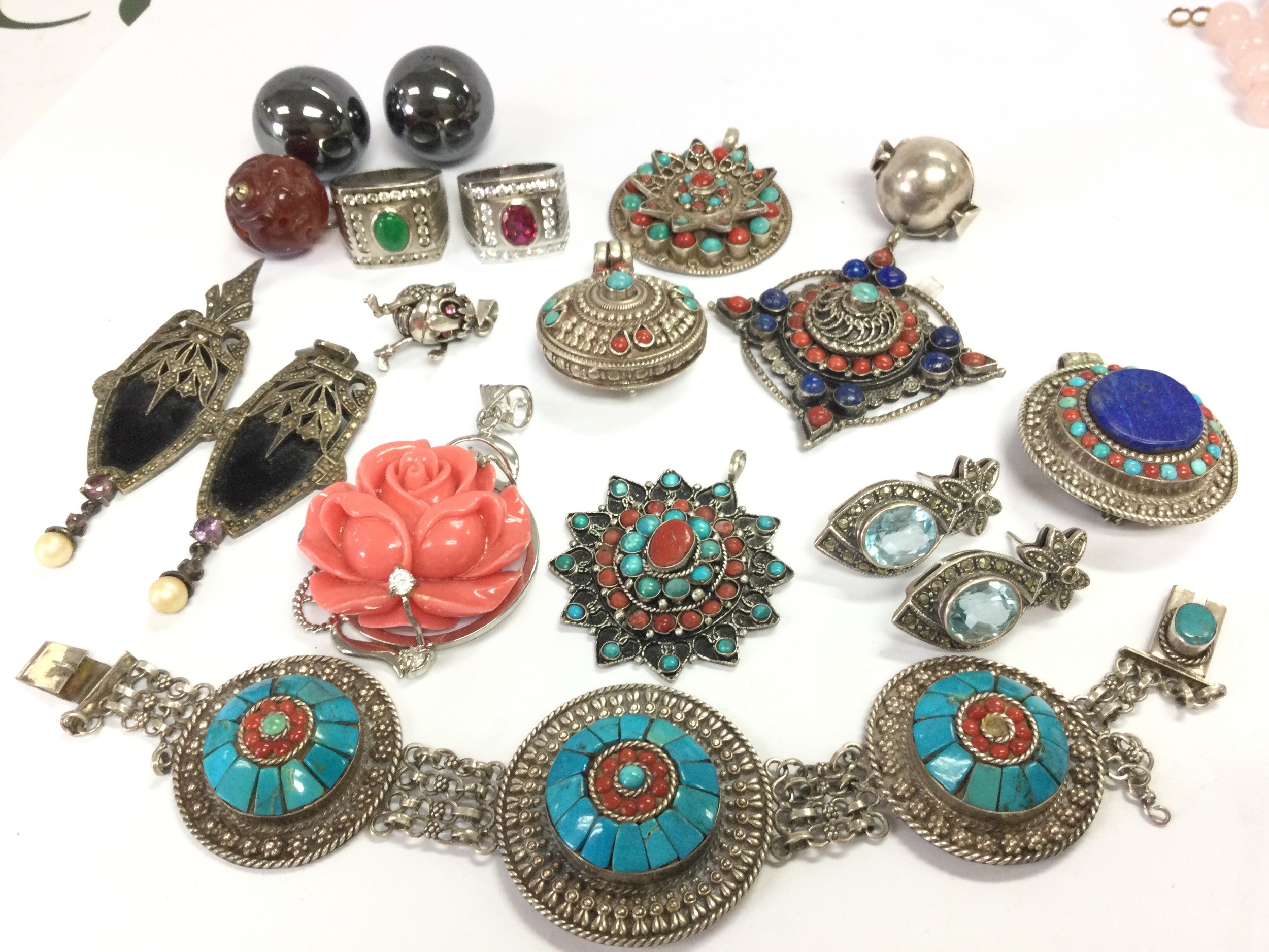 A collection of silver jewellery including earrings, pendants, rings etc. 260g total weight