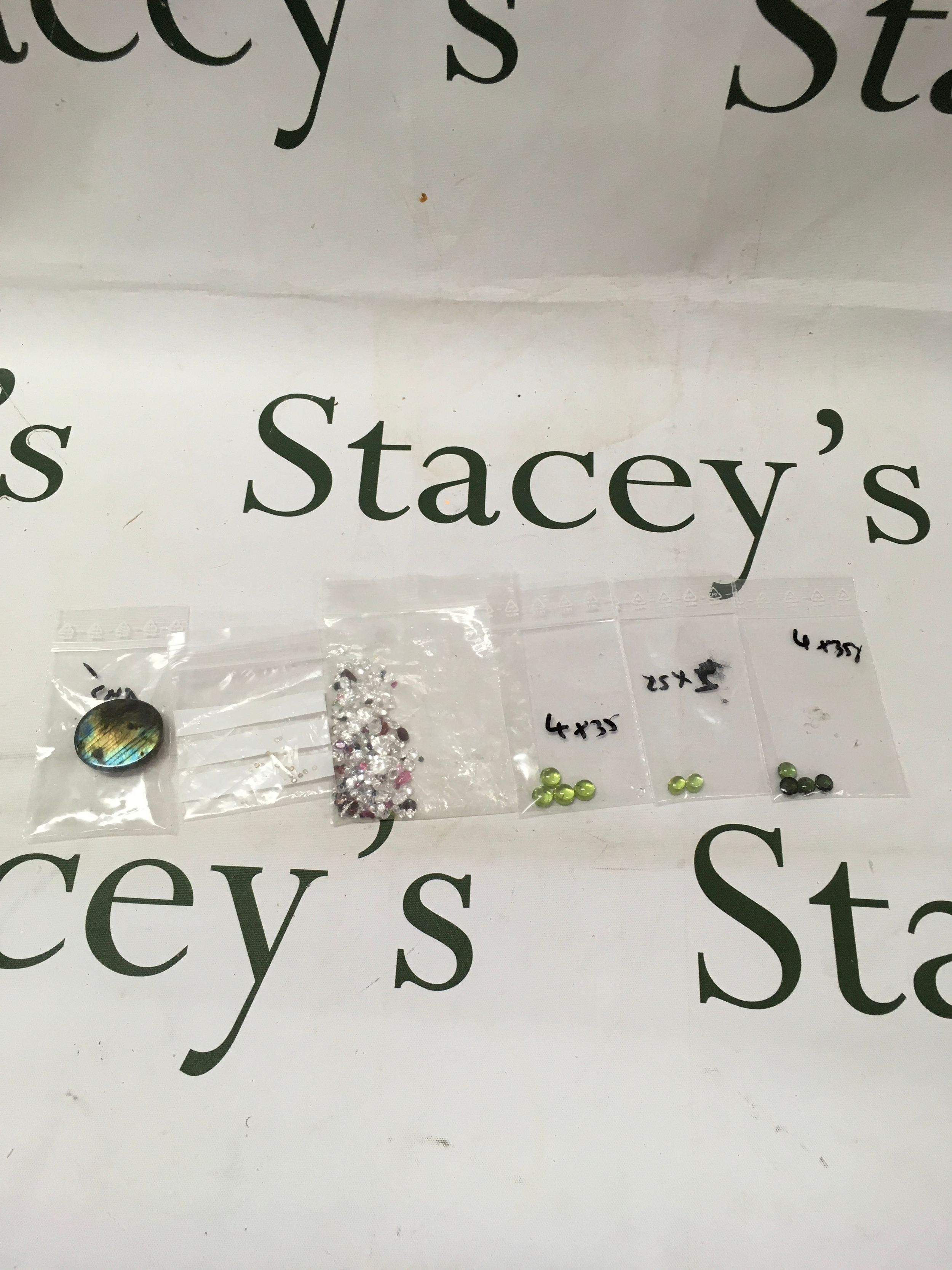 A mixed collection of coloured gems 