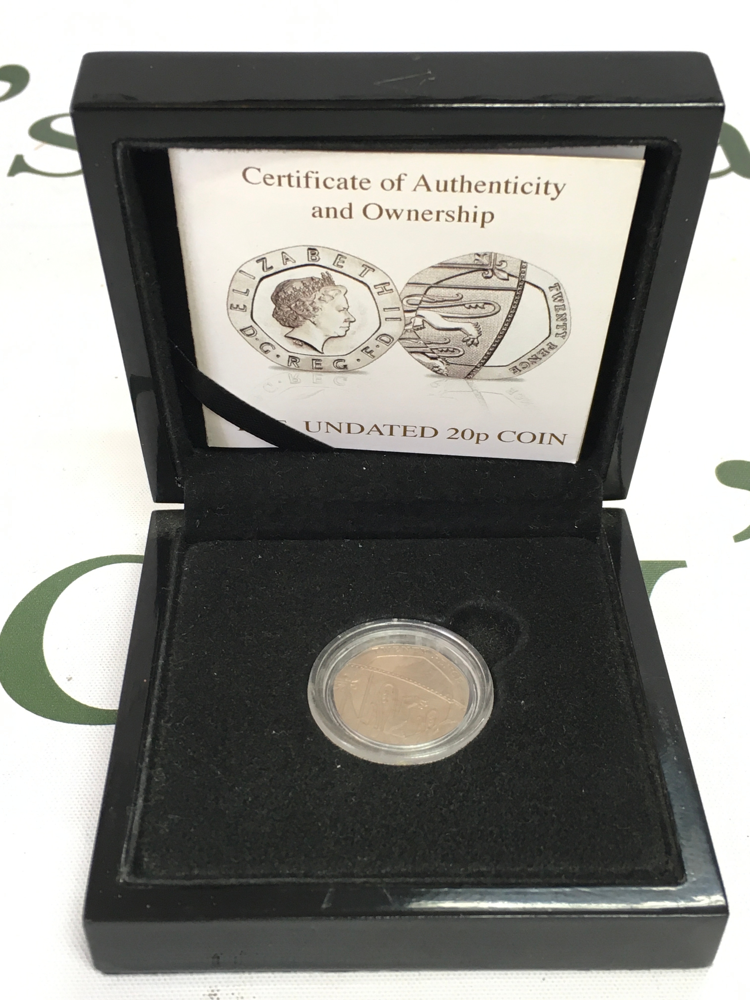 A undated 20p coin in mint condition with certificate 