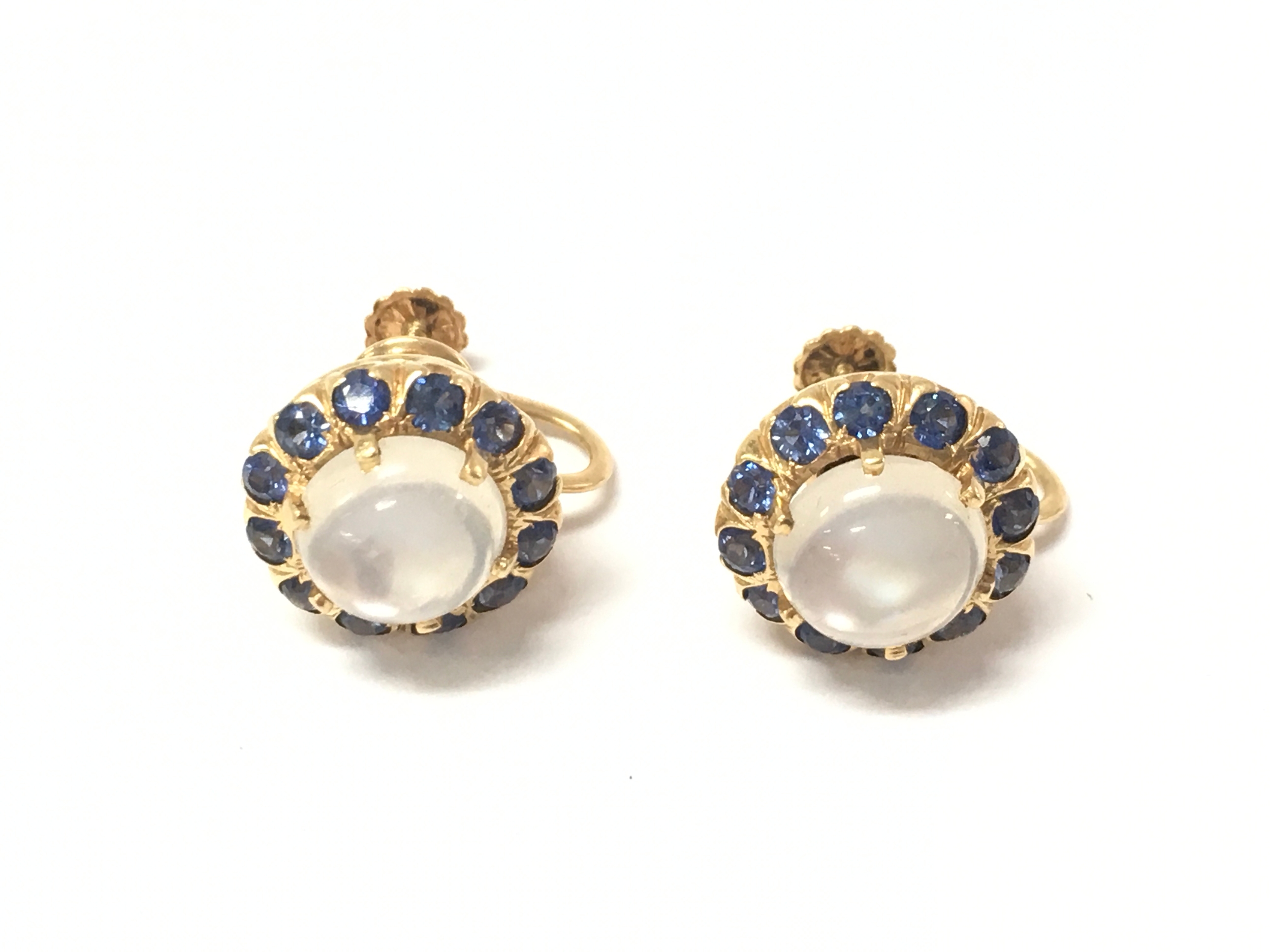 14ct gold earrings with central moonstone surrounded with sapphires. 6.20g