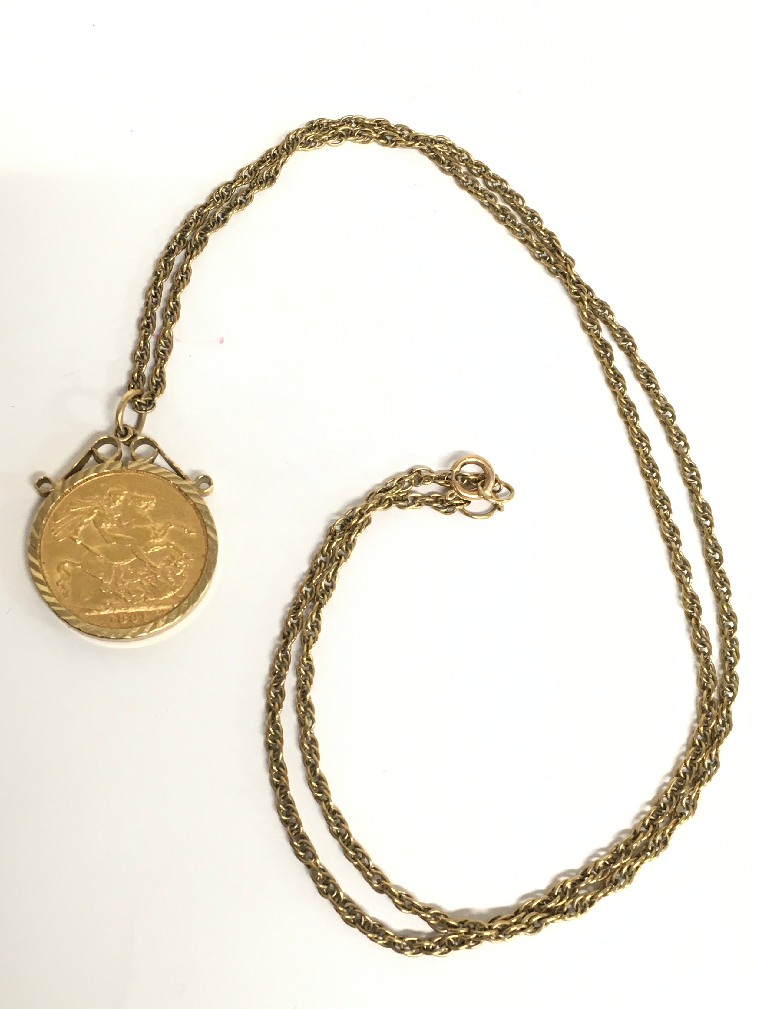 A Victorian 1891 sovereign in a pendant mount with a 9k gold chain (30cm long). 16.7g total weight