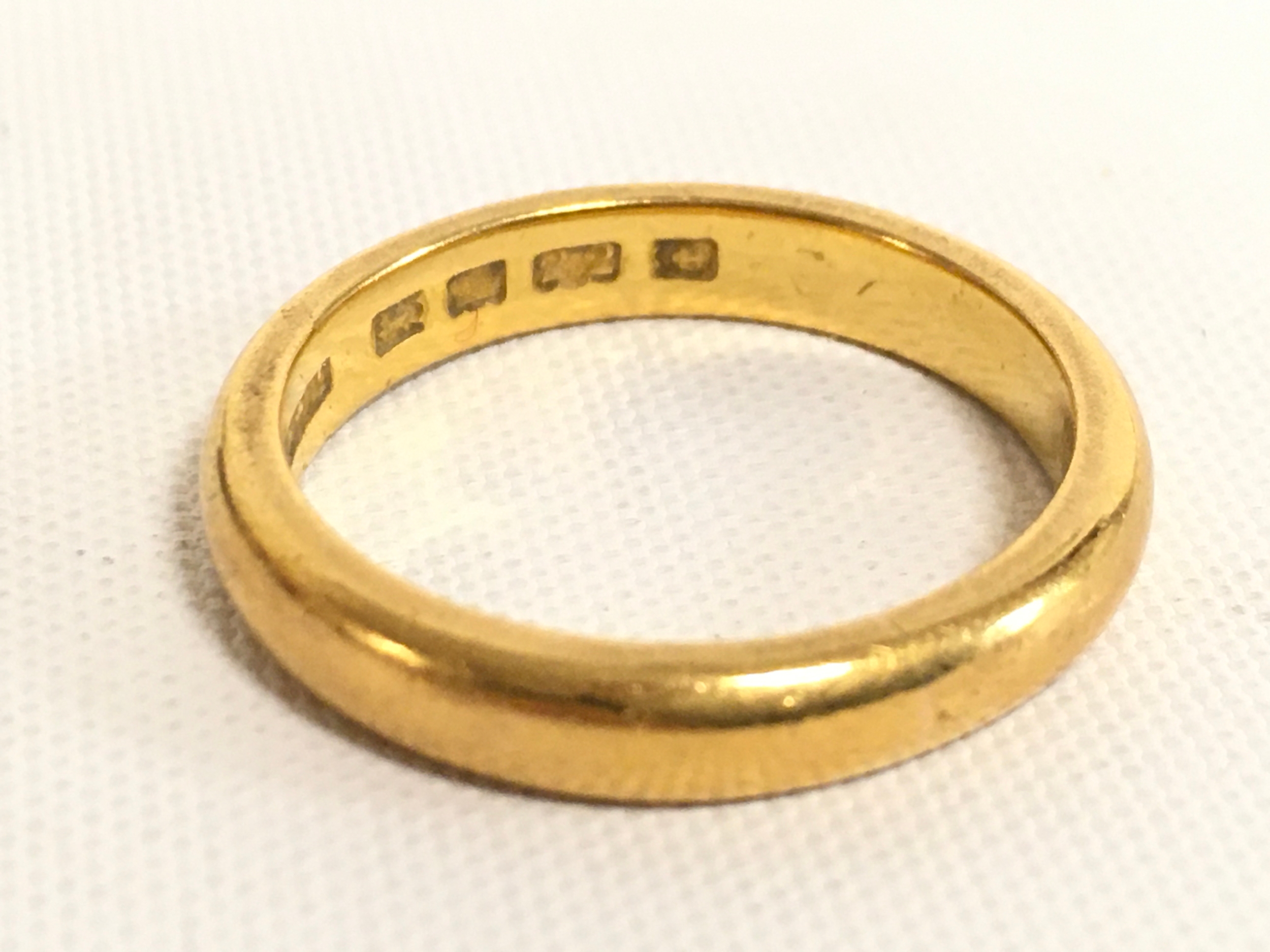 A 22ct gold ring . 6.3g total weight, size O