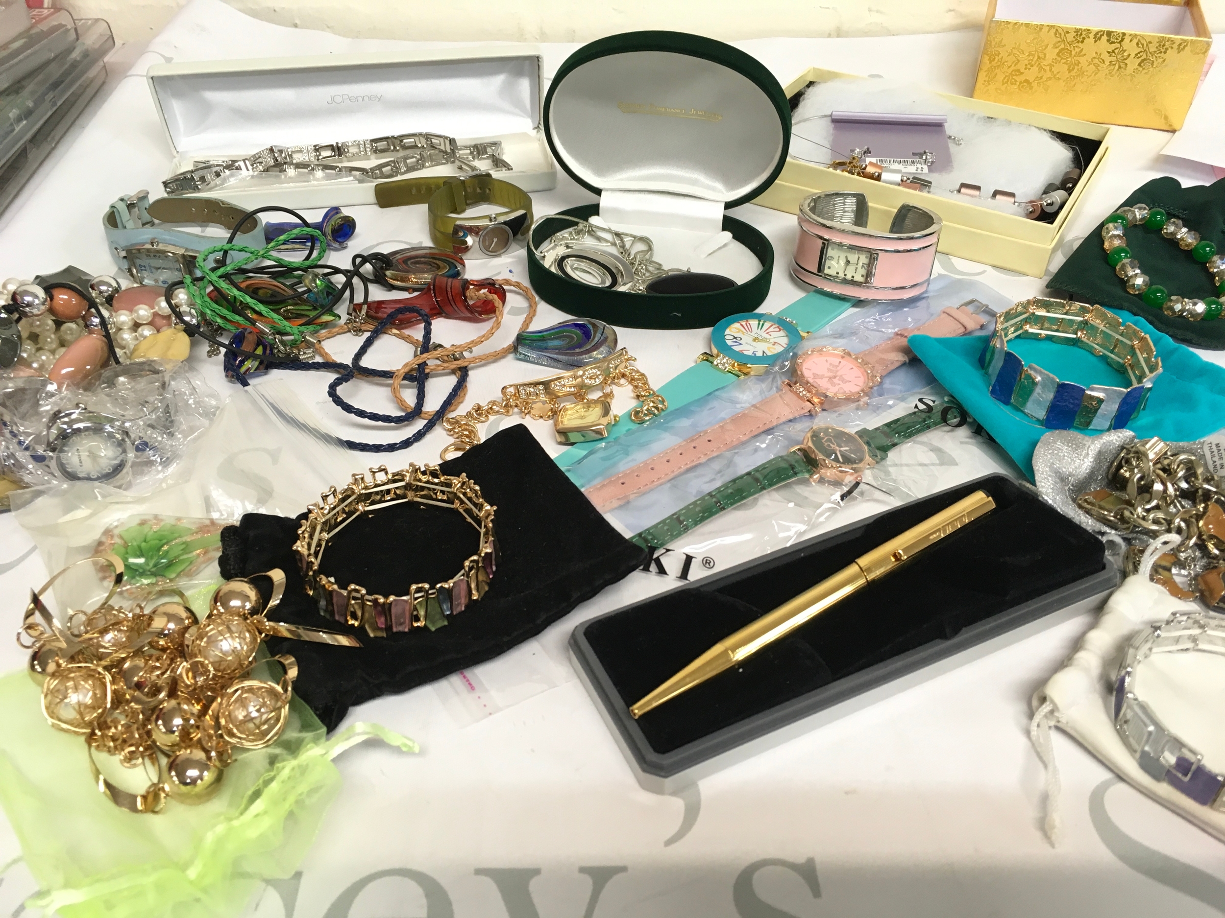 A collection of costume jewellery including bracelets, watches including Dnky, Pinbo, Soki, necklaces 