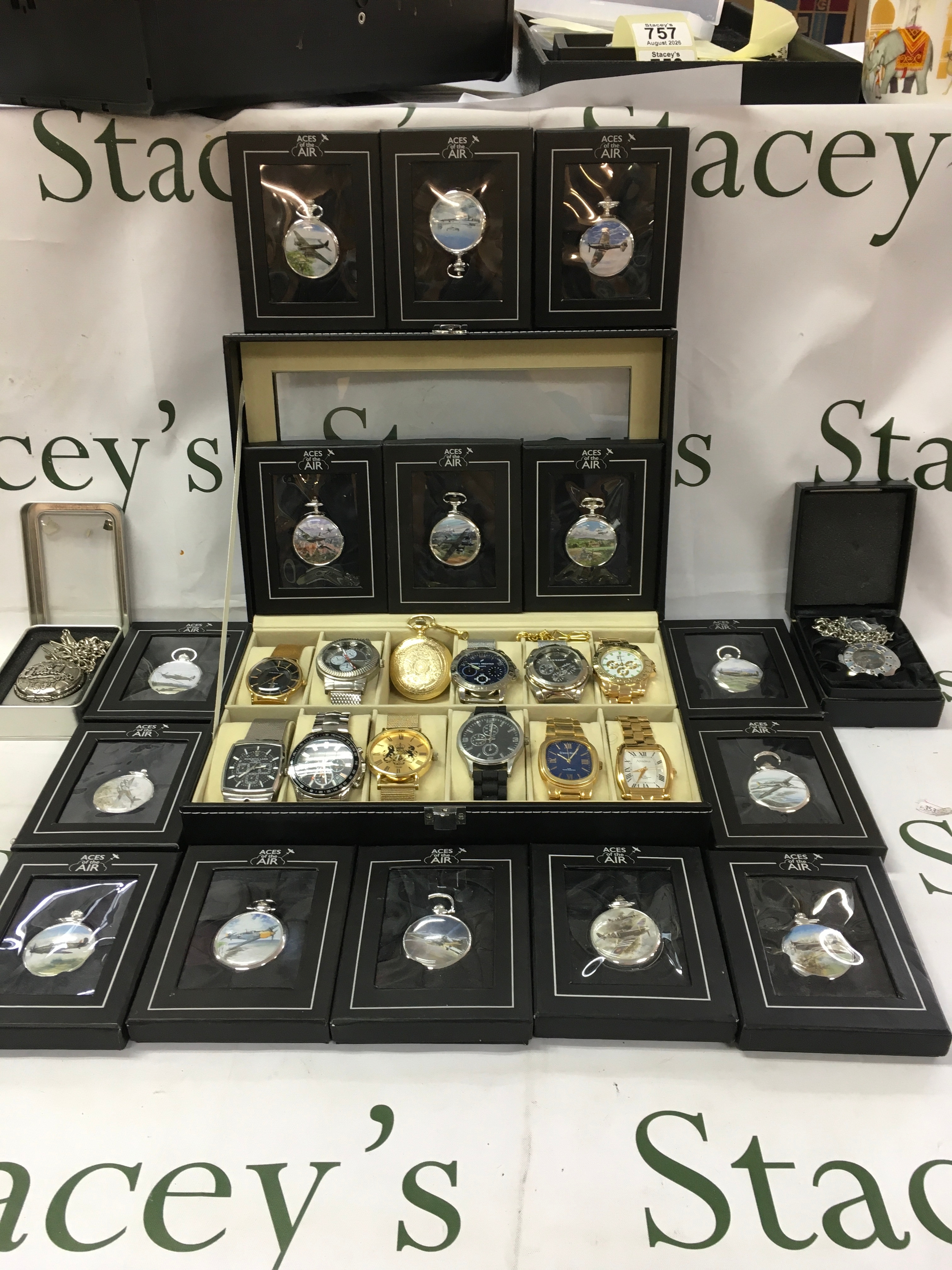 This is a vintage collection of different watches and pocket watches. 