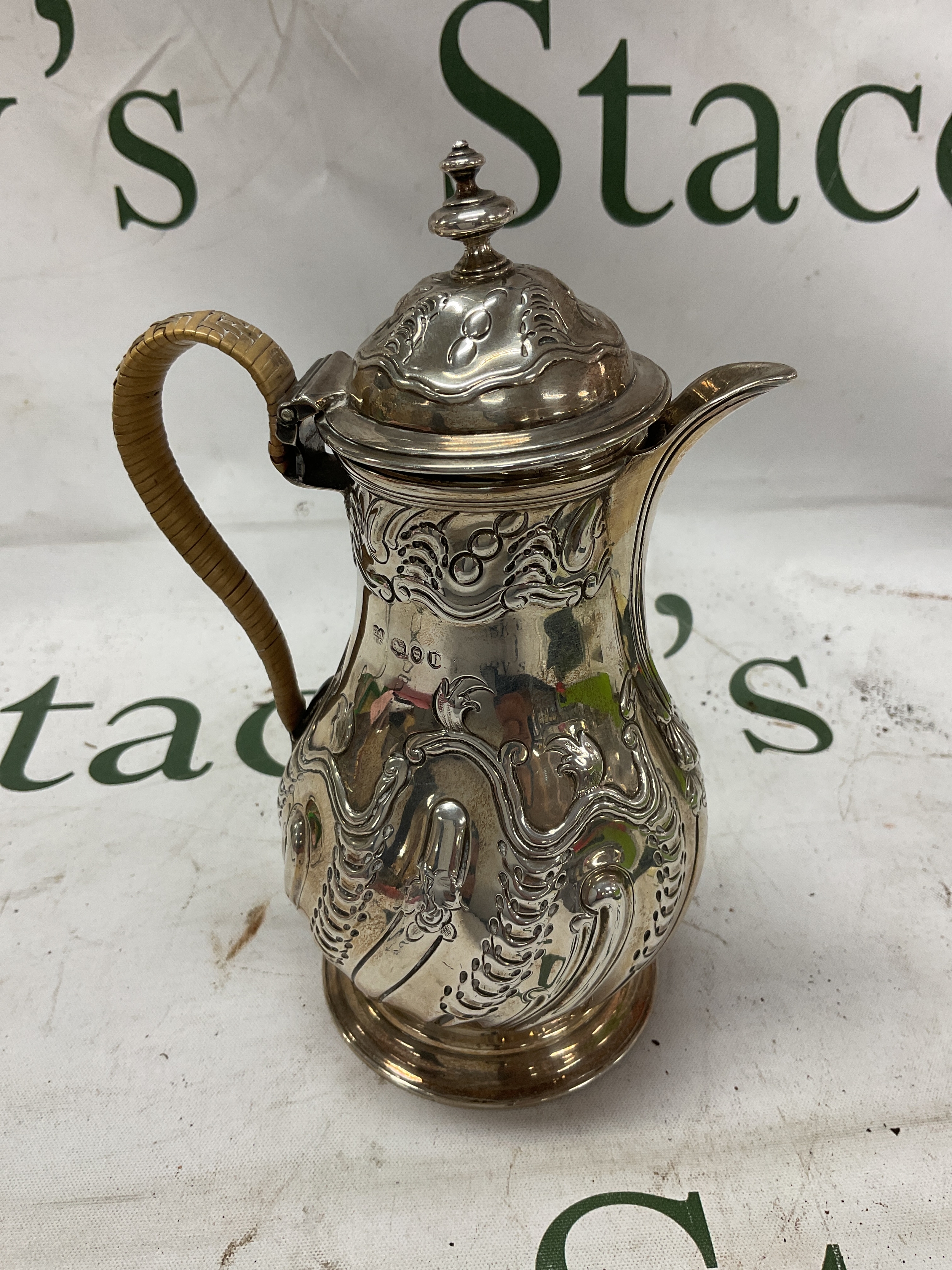 Victorian HM silver sparrow beak lidded jug, with wrapped handle and retailers mark to the base, J Parkes 12 Vigo street, hallmarks for London 1890 by John Aldwinckle and Thomas Slater. Weight 290 grams.