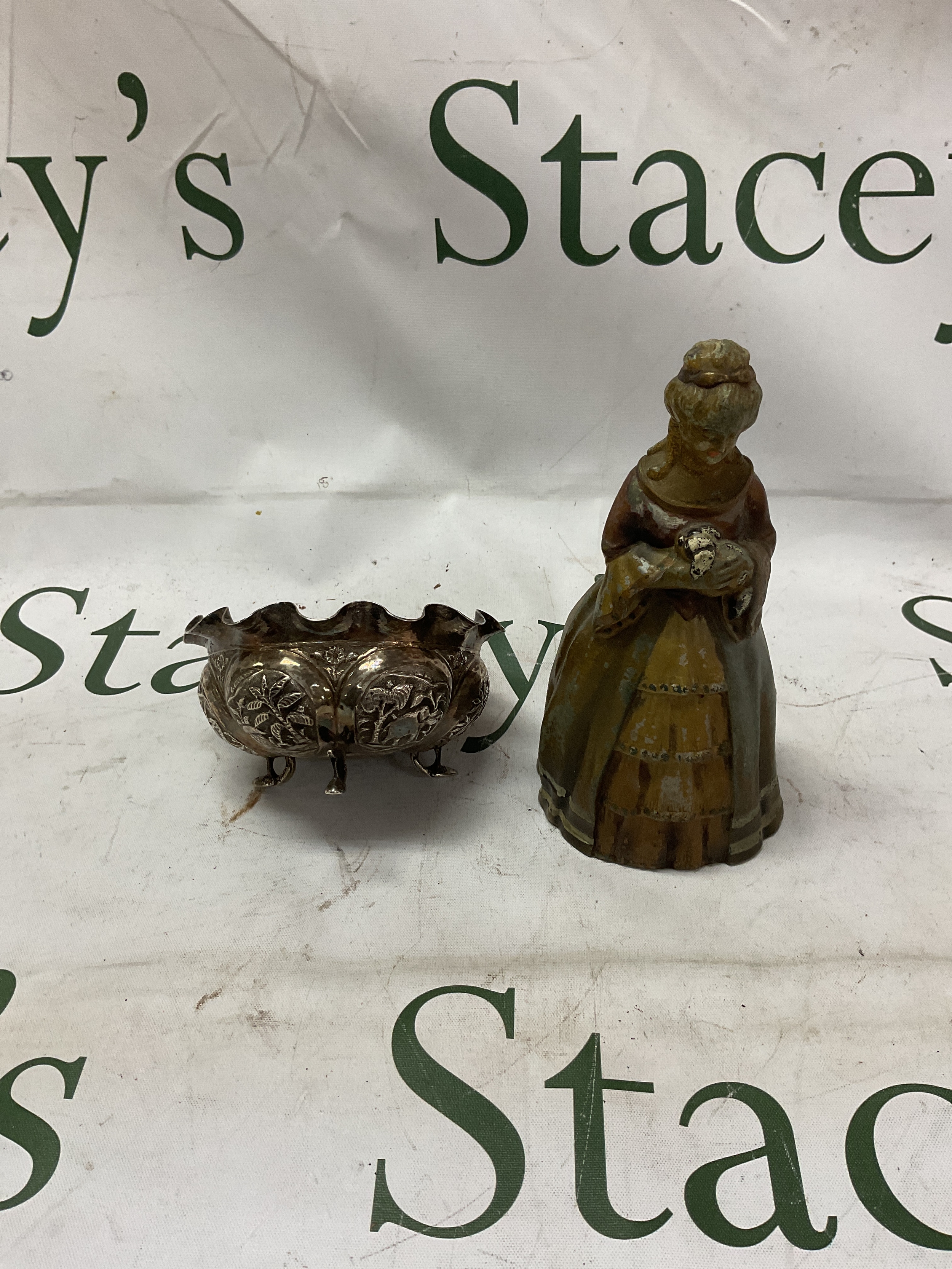 Indo-Chinese style silvered bowl and a vintage Edwardian table lighter in the form of a woman holding a puppy.