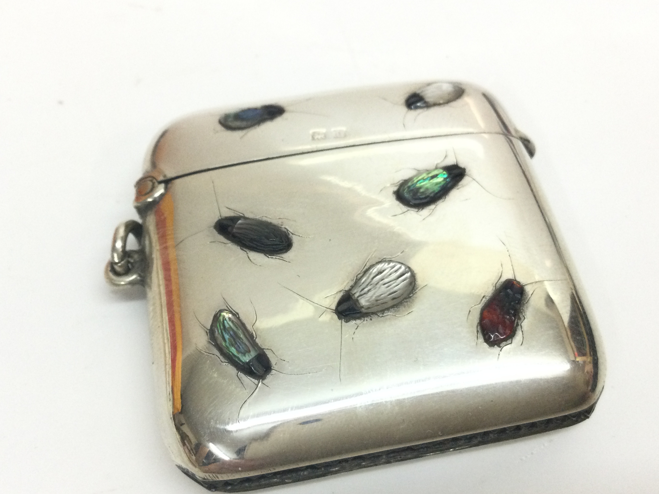 A silver Birmingham hallmarked shibayama Vesta case