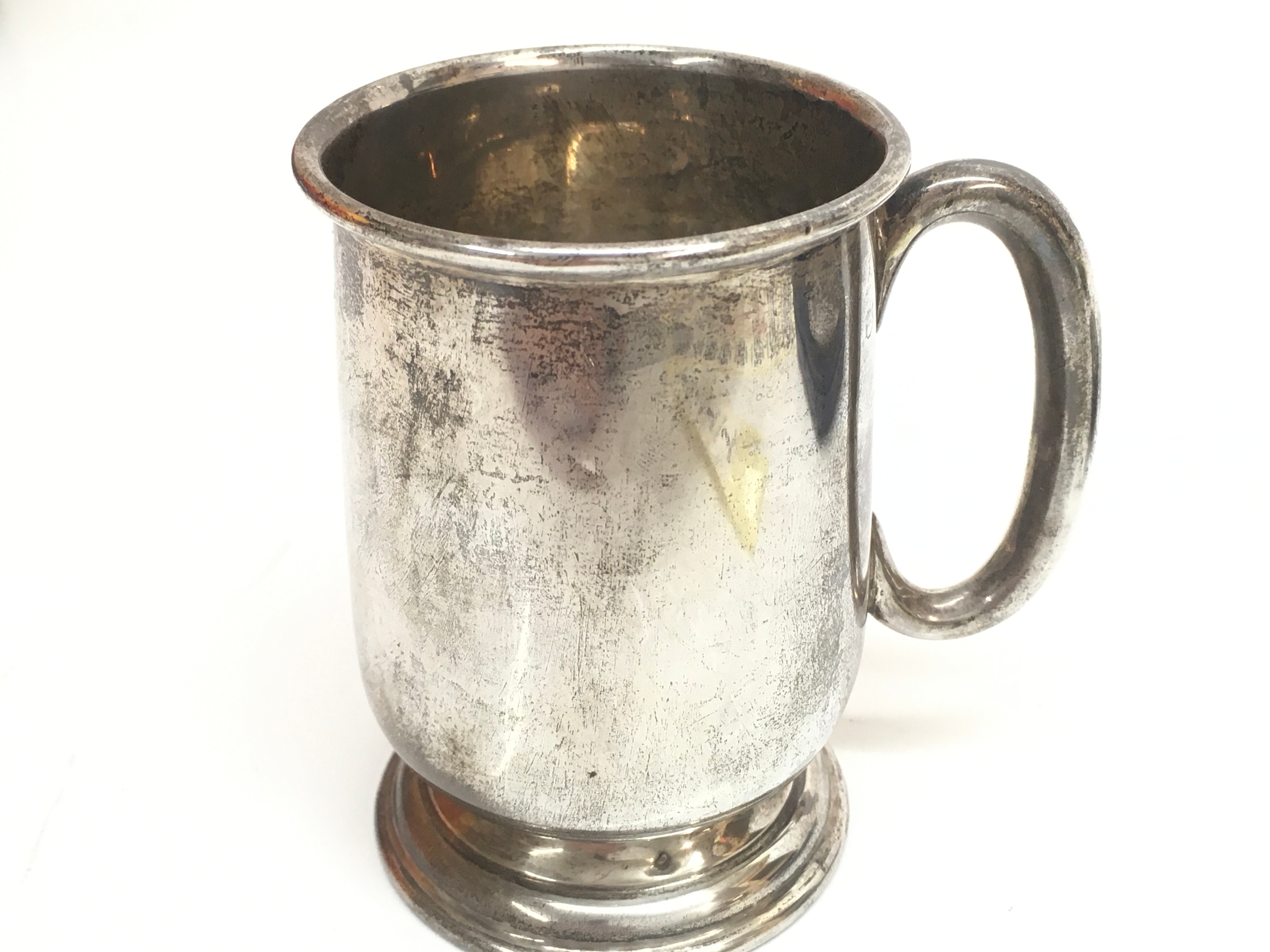 A silver hallmarked mug, marked Birmingham 1959. 8cm tall. 70g total weight 