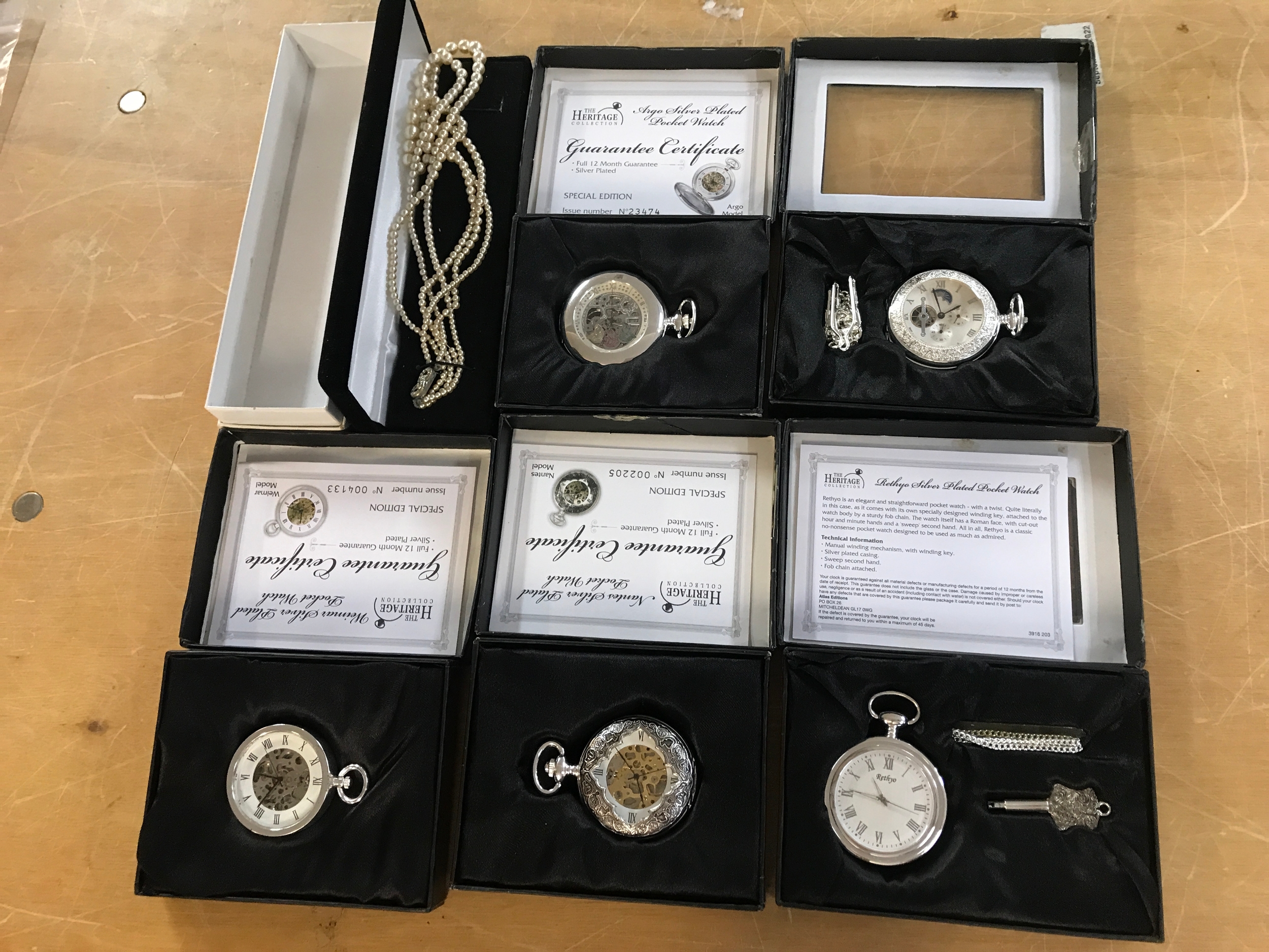 5 cased silver plated pocket watches and a Pearl necklace.
