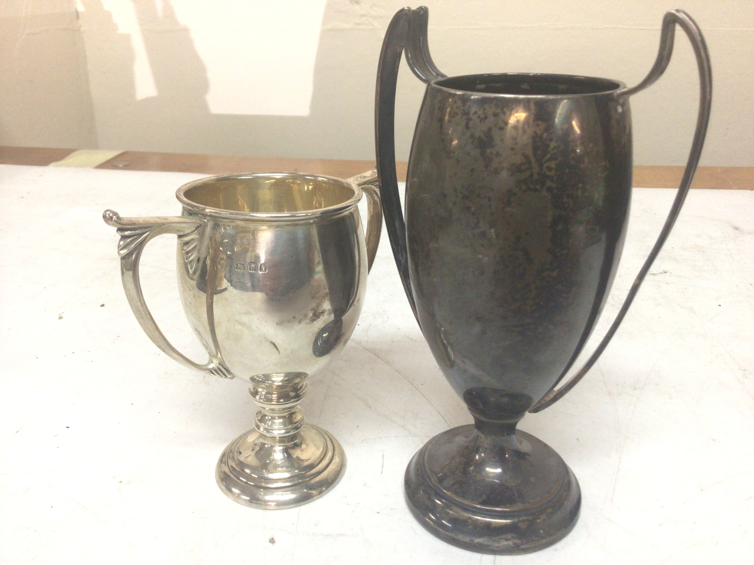 Two small Silver trophy cups weight 200g approximately (2) 