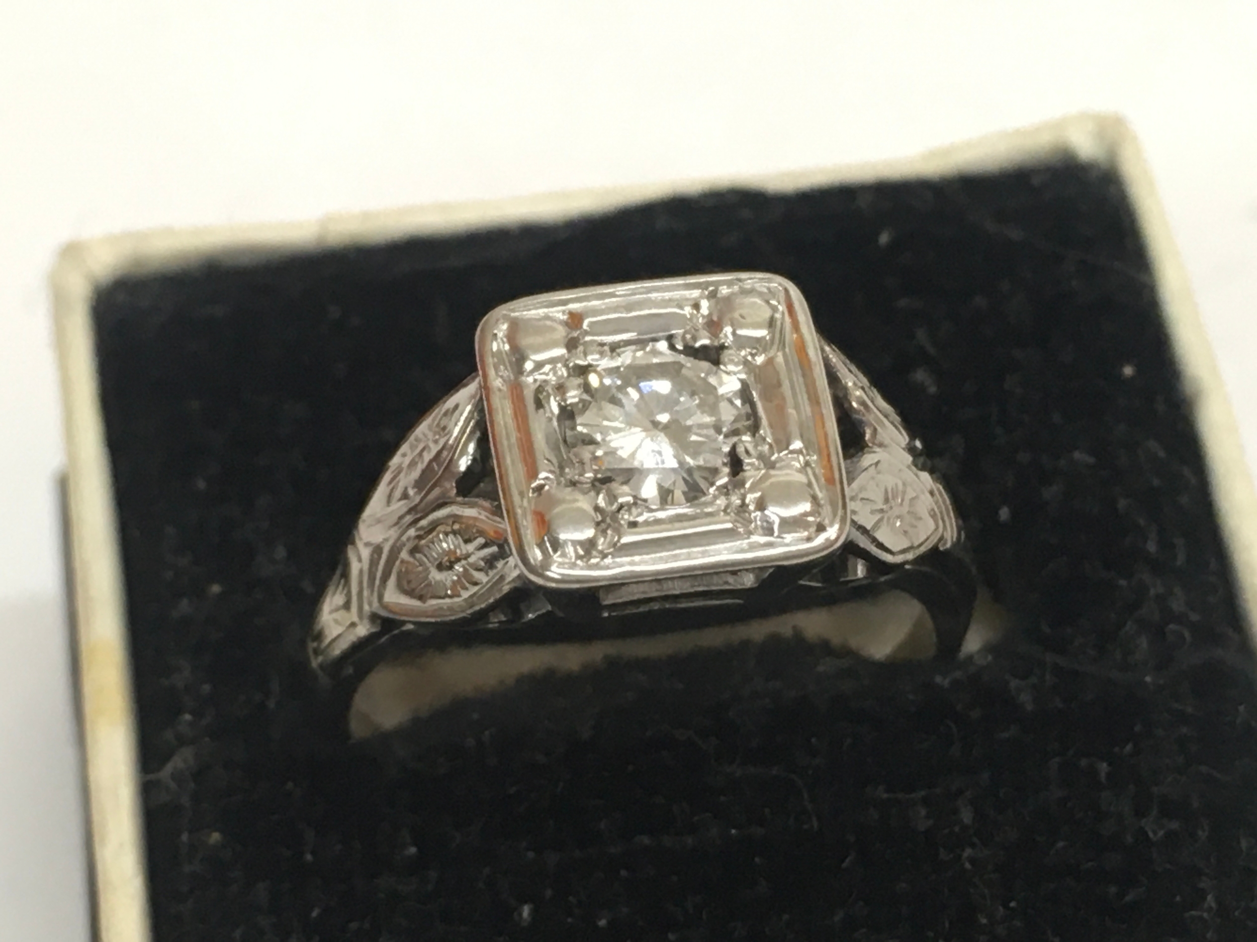 A 1930s 18ct white gold solitaire diamond ring Approx 0.65ct VSI/ G/H colour. Size M , 3.2g total weight 
