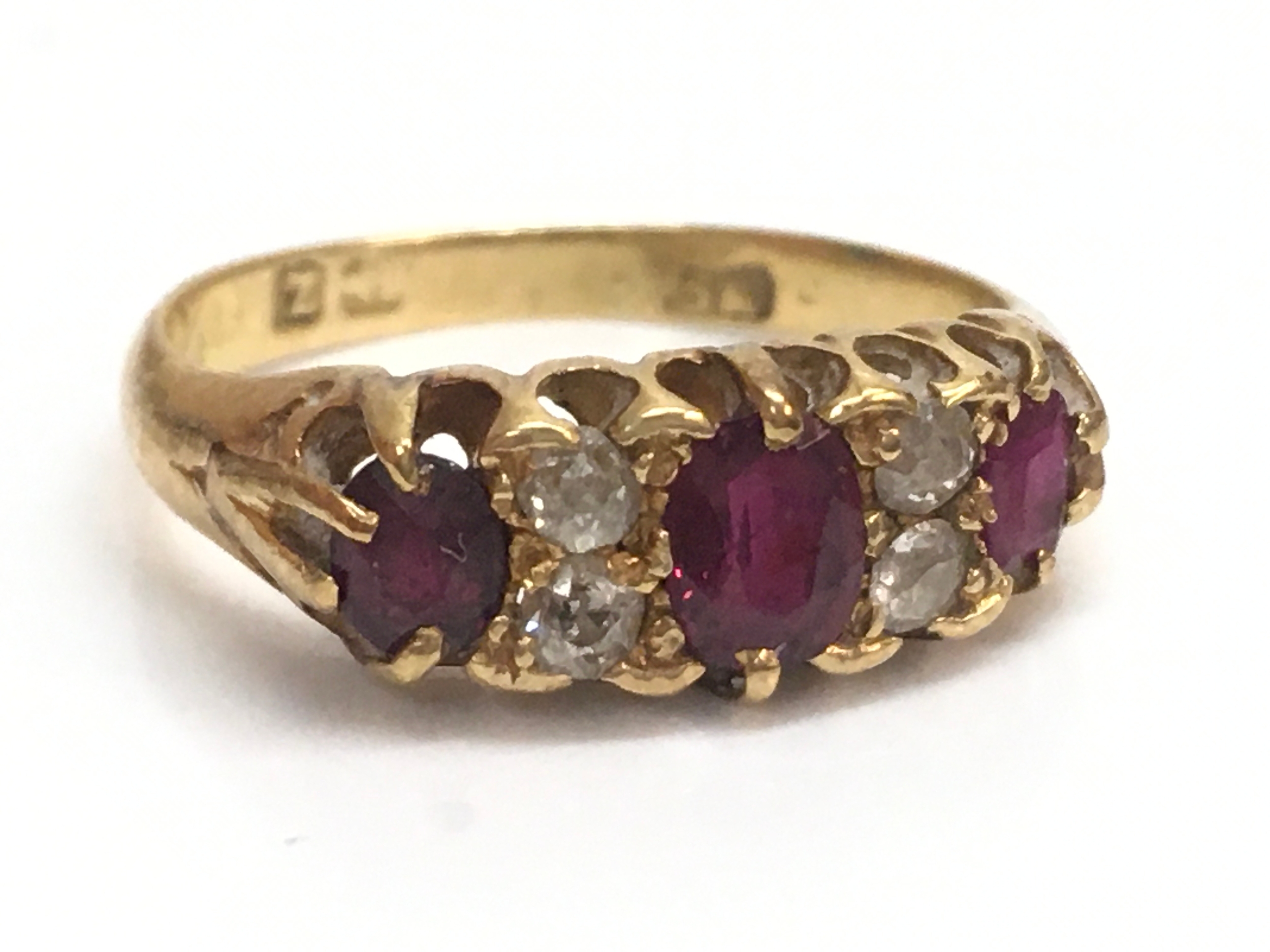 A 9ct ruby and rose cut diamond ring, size J, 3.4g total weight 