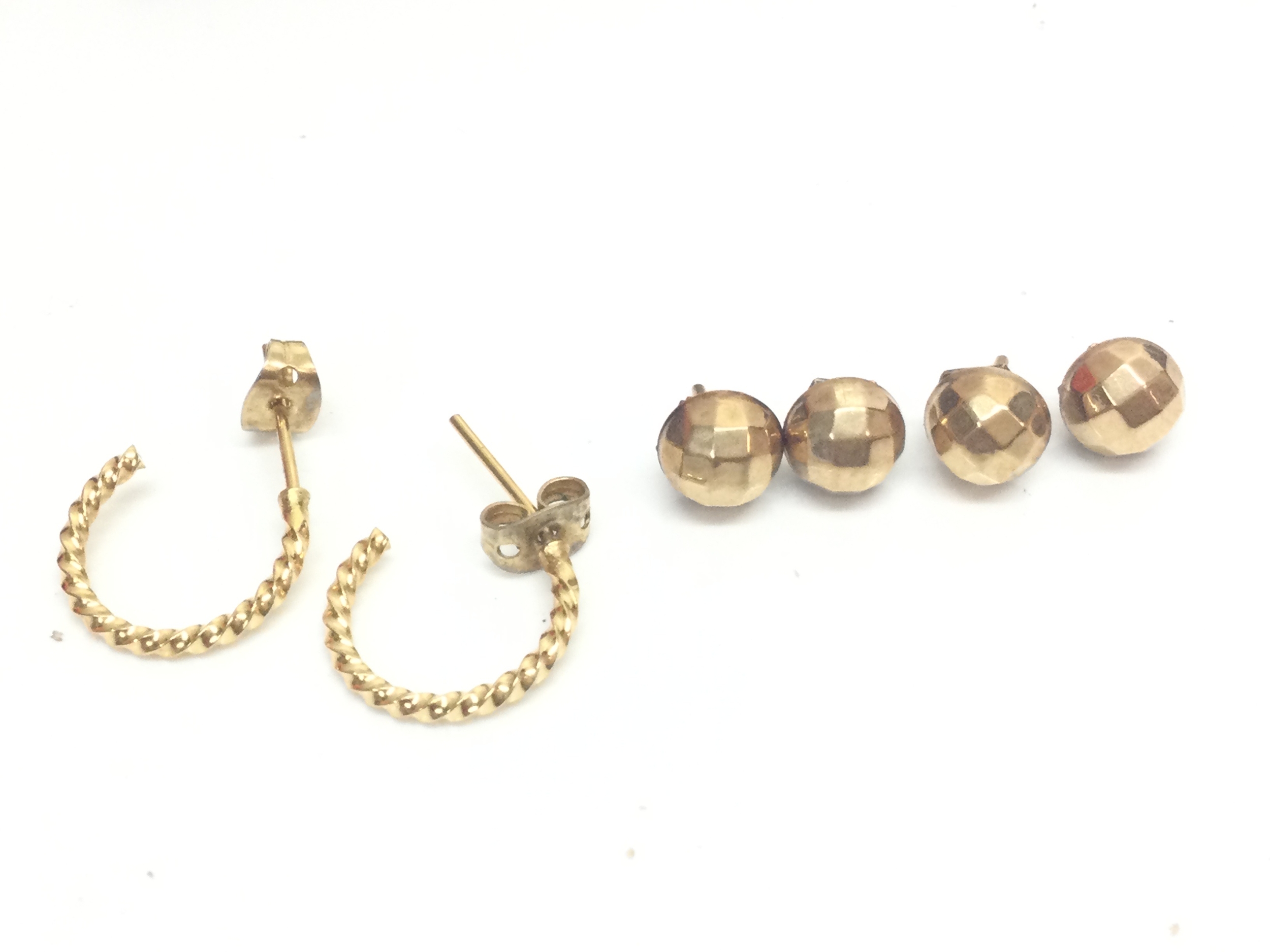 Three pairs of 9ct gold earrings, 2.4g total weight