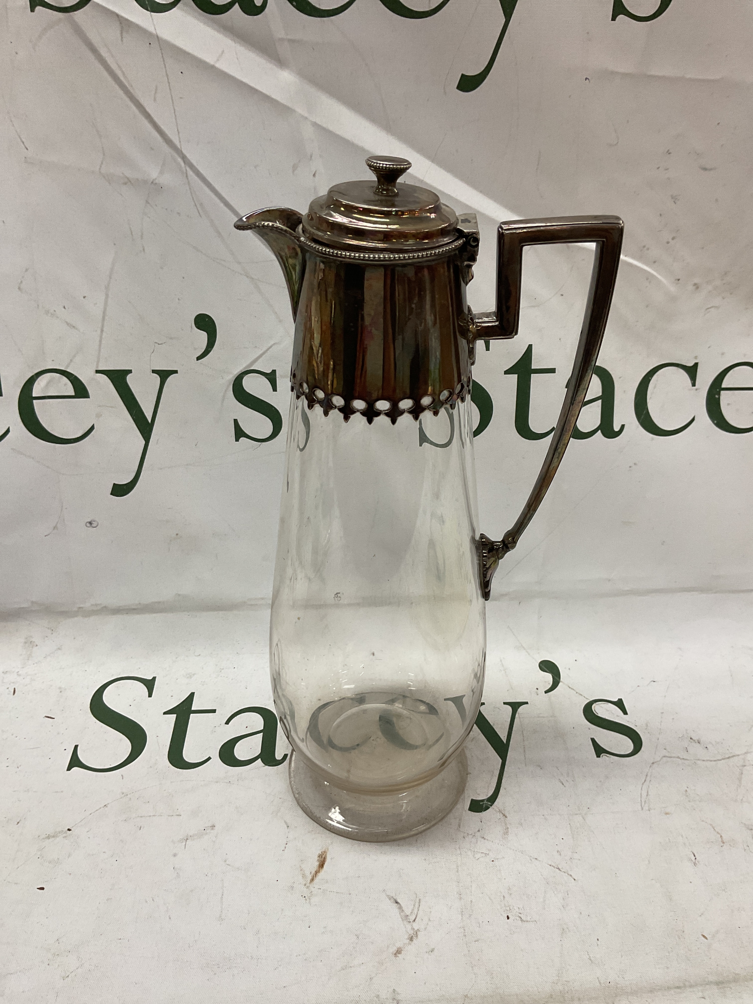 Victorian Elkington and Co claret jug with silver plated top and lid, with engraved monogram.29 cm